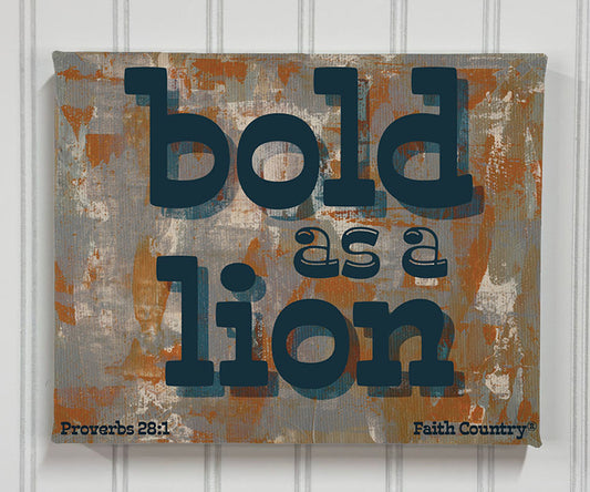 Straight-on photo of 'Bold as a Lion' scripture canvas print on wall with brushstroke texture and bold typography