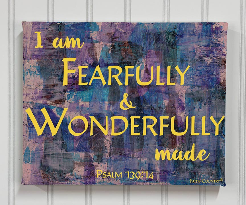 Front-facing canvas print of scripture artwork reading “I am fearfully & wonderfully made” on a vibrant purple and blue abstract background.