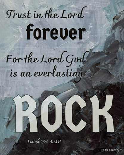 Close-up of scripture canvas art with 'Trust in the Lord forever, for the Lord God is an everlasting Rock' on an abstract blue and gray background with bold typography emphasizing the word 'Rock.'