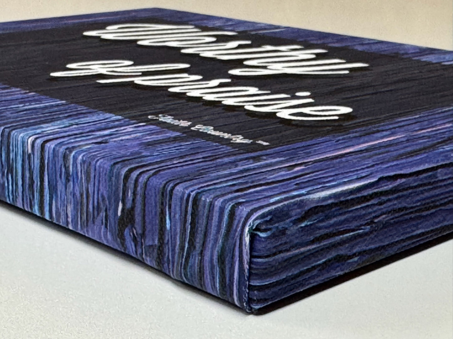 A side angle view of the "Worthy of Praise" canvas wall art, highlighting the wraparound design on the canvas edges